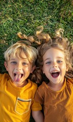 Two kids laying in the grass with big smiles. AI.