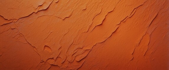 Fototapeta premium Close-up of Orange Textured Surface with Cracks and Ridges
