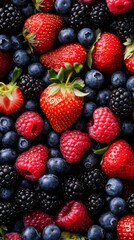 Vibrant Mix of Fresh Berries: Strawberries, Blueberries, Raspberries, and Blackberries. Background