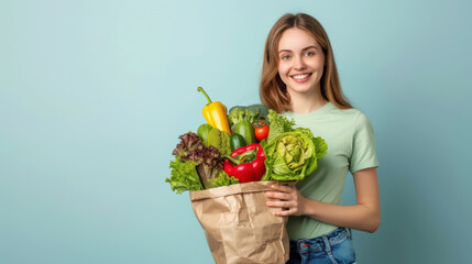 The young woman holding groceries
