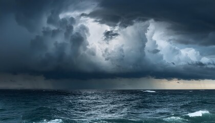 Stormy seas beneath dark clouds indicate the coming monsoon.