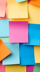 Fototapeta premium An artistic and colorful collection of sticky notes, arranged on a bright and vibrant background