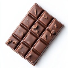 Obraz premium Closeup of a chocolate bar with chocolate pieces on top, isolated on white background.