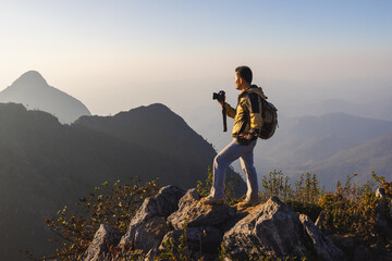 Nature Photography Concept. Professional Nature Professional Nature Photographer taking photos on...