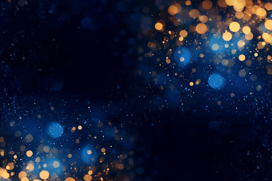 Bokeh lumineux de points dor&eacute;s et bleus sur un fond sombre, cr&eacute;ant une ambiance festive et &eacute;l&eacute;gante - guirlandes de no&euml;l, sapin de no&euml;l, f&ecirc;te de fin d'ann&eacute;e espace n&eacute;gatif copyspace