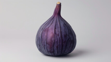 Fototapeta premium A whole fig isolated on a white background