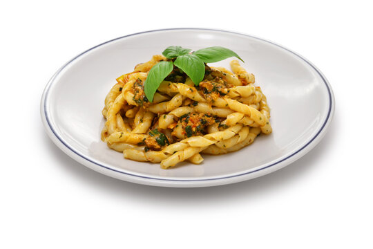 Busiate alla Trapanese is made from a specialty pasta from the province of Trapani called Busiate, then boiling it and tossing it in a Trapanese sauce made primarily from almonds. Italian cuisine.
