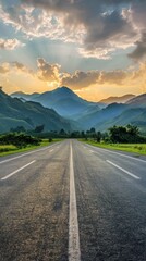 Naklejka premium A long road with mountains in the background