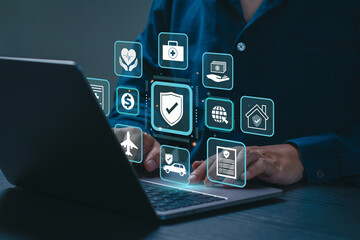 Insurance concept. Businessman using laptop with insurance policy online icons for medical health,...