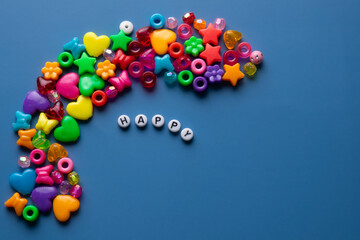 Assorted Beads spelling the word happy