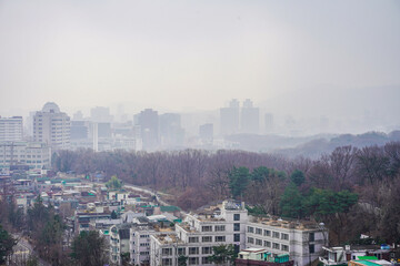 The Secret Garden of Changdeokgung Palace and the cityscape of Seoul, South Korea.