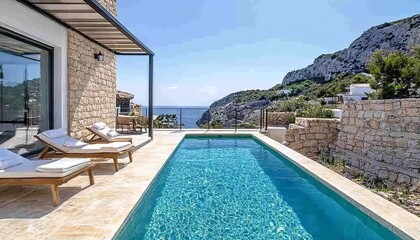 Fototapeta premium Luxury villa with private swimming pool and stunning sea view. Summer vacation rental concept.