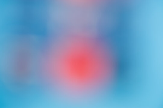 Abstract blurred background, red spot on blue gradient background.