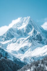 Obraz premium Snow-capped mountains under a clear blue sky, winter weather, cold and majestic
