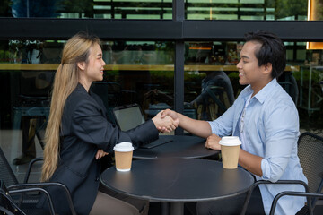 A businesswoman is thanking a client who showed interest in her work and agreed to do business with her.