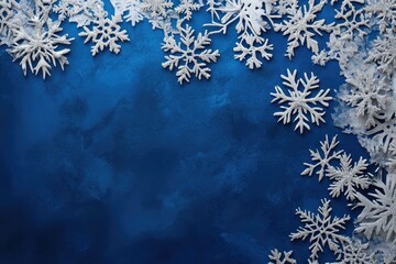 Elegant Christmas background with silver snowflakes on a deep blue backdrop