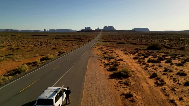 Aerial view of forrest gump road winding through the majestic desert landscape of monument valley, oljato monument valley, united states.