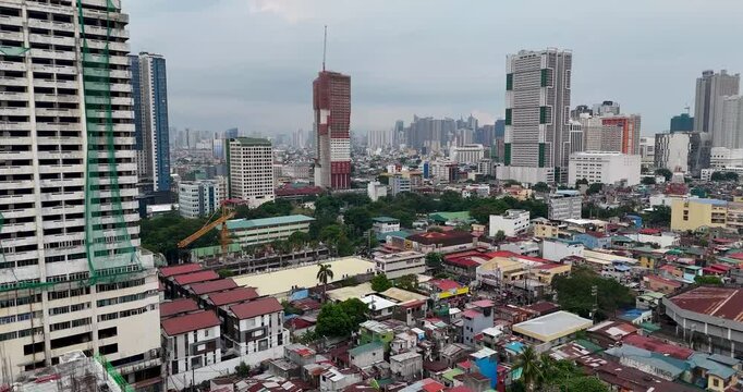 The elegant cityscape of Manila, Philippines, captured from above by a sophisticated drone, showcases the charm of the stunning residences below.