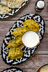 boiled manti with meat. Uzbek cuisine.