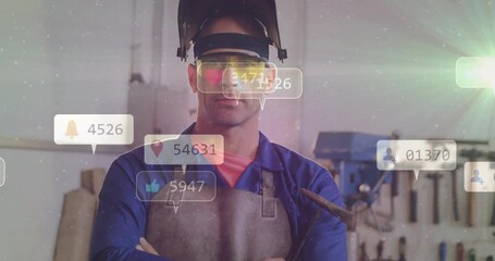 Social media likes and follower count animation over industrial worker in workshop - Powered by Adobe