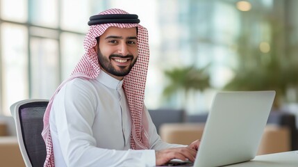 Arab businessman using a laptop