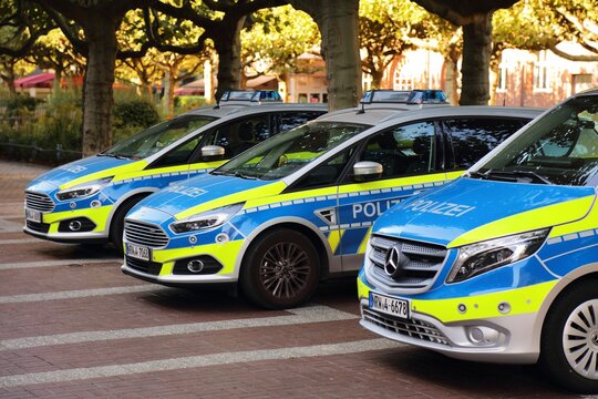 OBERHAUSEN, GERMANY - SEPTEMBER 18, 2020: German Police (Polizei) Ford and Mercedes-Benz cars parked in Oberhausen, Germany.