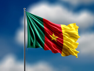 Cameroon flag flying on blur blue clouds background.