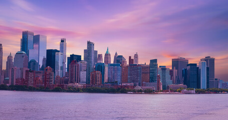Sunset view of lower Manhattan from Jersey City waterfront, New York, New York, USA