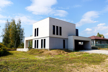 Villa construction. Prefab house under construction. Suburban house Construction. Prefabricated...