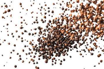 Naklejka premium Dynamic Black and Brown Peppercorn Explosion