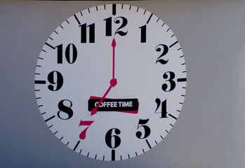 Time showing the break for coffee . High quality photo