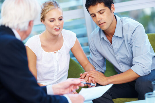 Financial advisor, consulting and couple in meeting with documents for planning, insurance and mortgage. Contract, discussion and man and woman with consultant for finance review, budget and help