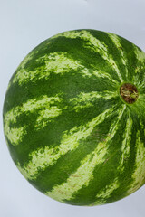 Close-up watermelon on white, isolated background. Selective focus.