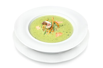 Creamy broccoli soup with garnished vegetables