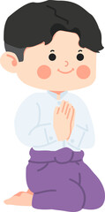 boy in Thai traditional greeting