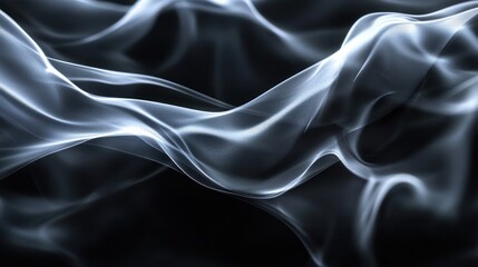 Obraz premium Graceful swirls of mist dance across a dark background, creating an ethereal and calming effect.