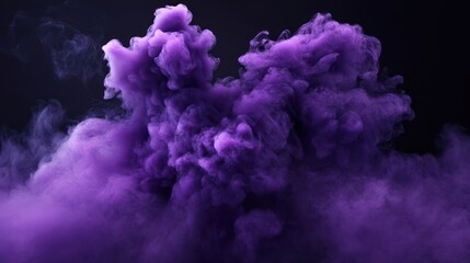 Fototapeta premium A dramatic burst of purple smoke swirling against a dark background, creating a sense of mystique and allure.