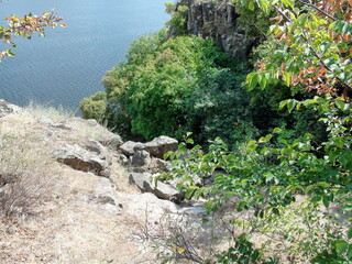 The dangerous descent to the water through the sharp stones of the coastal rocks sometimes lures adventure seekers.