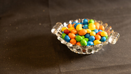 Colored Cany and water drops for abstract or background