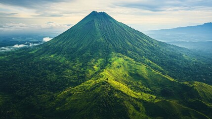 Fototapeta premium Majestic Southeast Asian volcano with a lush green base, towering over the landscape, no people