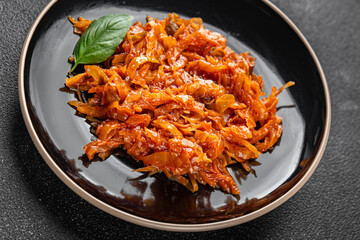 Braised cabbage suerkraut tomato sauce vegetable dish fresh delicious gourmet food background on the table rustick food top view copy space keto and paleo diet vegetarian and vegan food