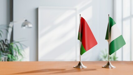 FLAGS OF BELARUS AND NIGERIA ON TABLE