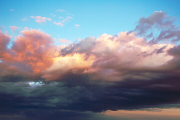 striking post-sunset sky, with a dynamic array of red and orange hues blending into soft purples and blues, evoking a sense of calm and awe as the day ends