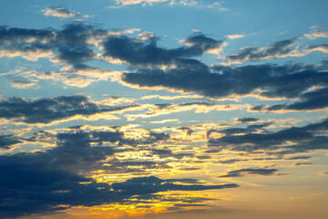 tranquil sky after sunset, displaying a smooth gradient of pastel pinks and blues, with the last...