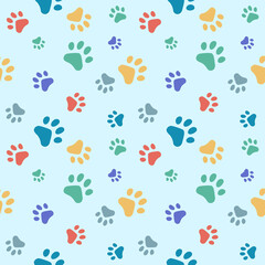 Seamless pattern with cat paw prints. Endless pattern with paw. Multicolored paws on a blue background. Pattern for textiles, wrapping paper, etc.