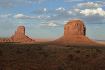 Orange rock formations in the summer at Monument Valley Navajo National Park, USA