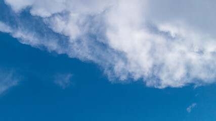 Blue sky and fluffy clouds after rain