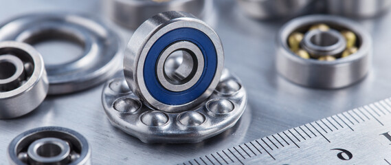 different bearings on a metal background. Part of mechanism.