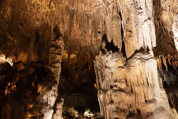 Cave interior with stalactites and stalagmites. Natural photo
