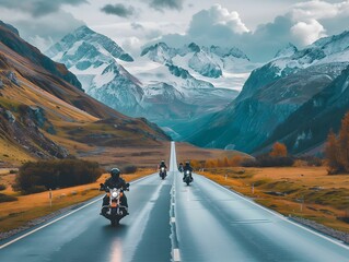 Motorcyclists cruising along a scenic mountain highway surrounded by stunning peaks and vibrant autumn foliage in the early morning